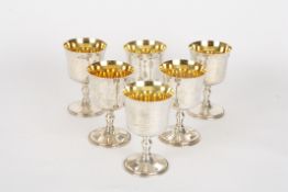 A set of six contemporary silver gobletshallmarked 1992, the bowls with silver gilt interiors,