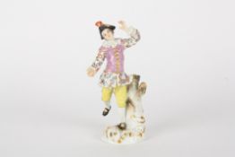 Late 20th century Meissen figure of a dancing shepherd, after Meyer, raised on a rococo base, blue
