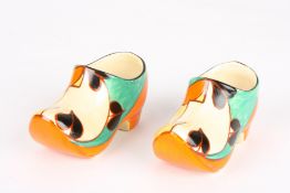 A rare pair of Clarice Cliff 'Feather and Leaves' Fantasque Bizarre clogspainted in bright