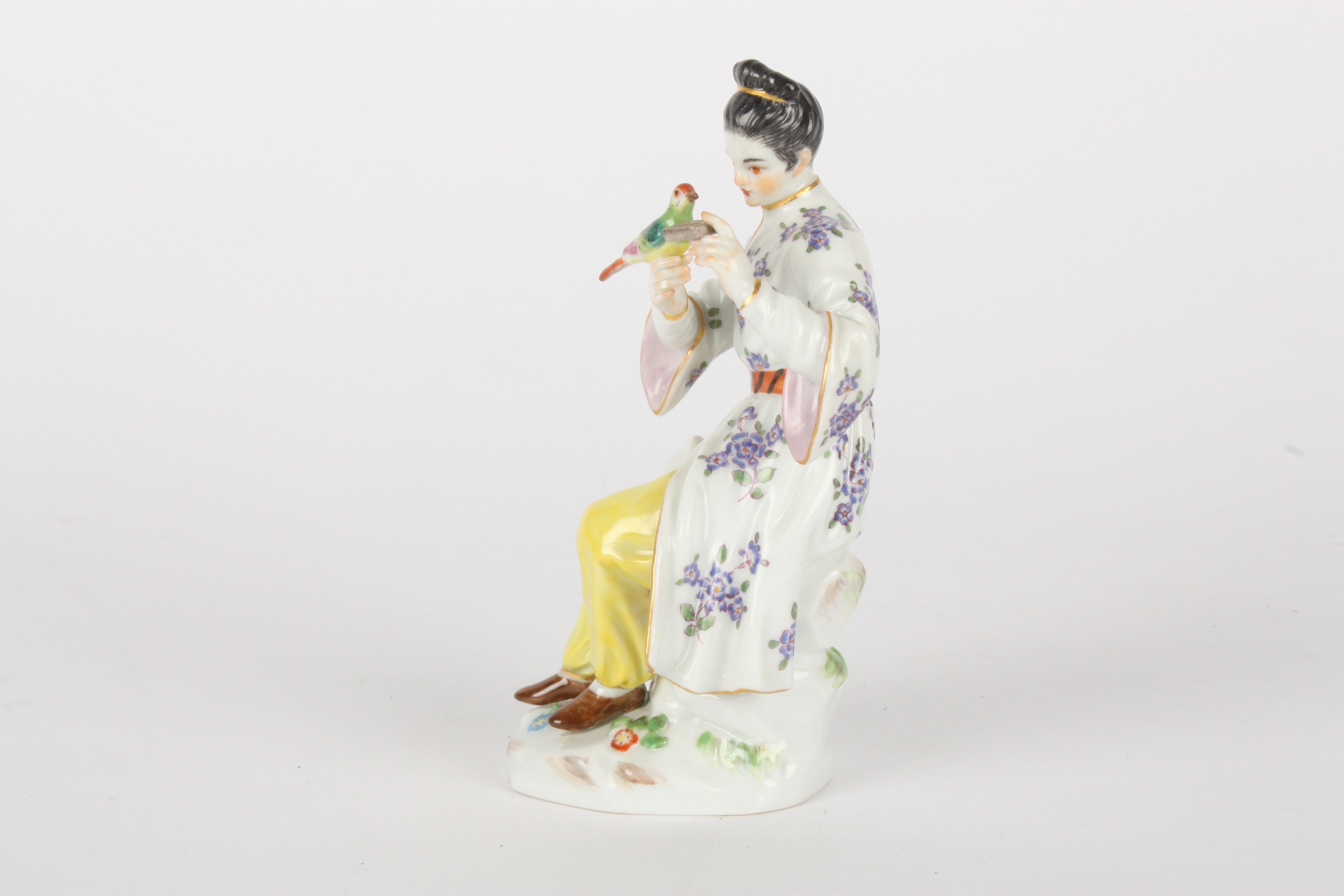 Late 20th century Meissen figure, after Elias Meyer, modelled as a seated Japanese lady feeding an - Image 3 of 5