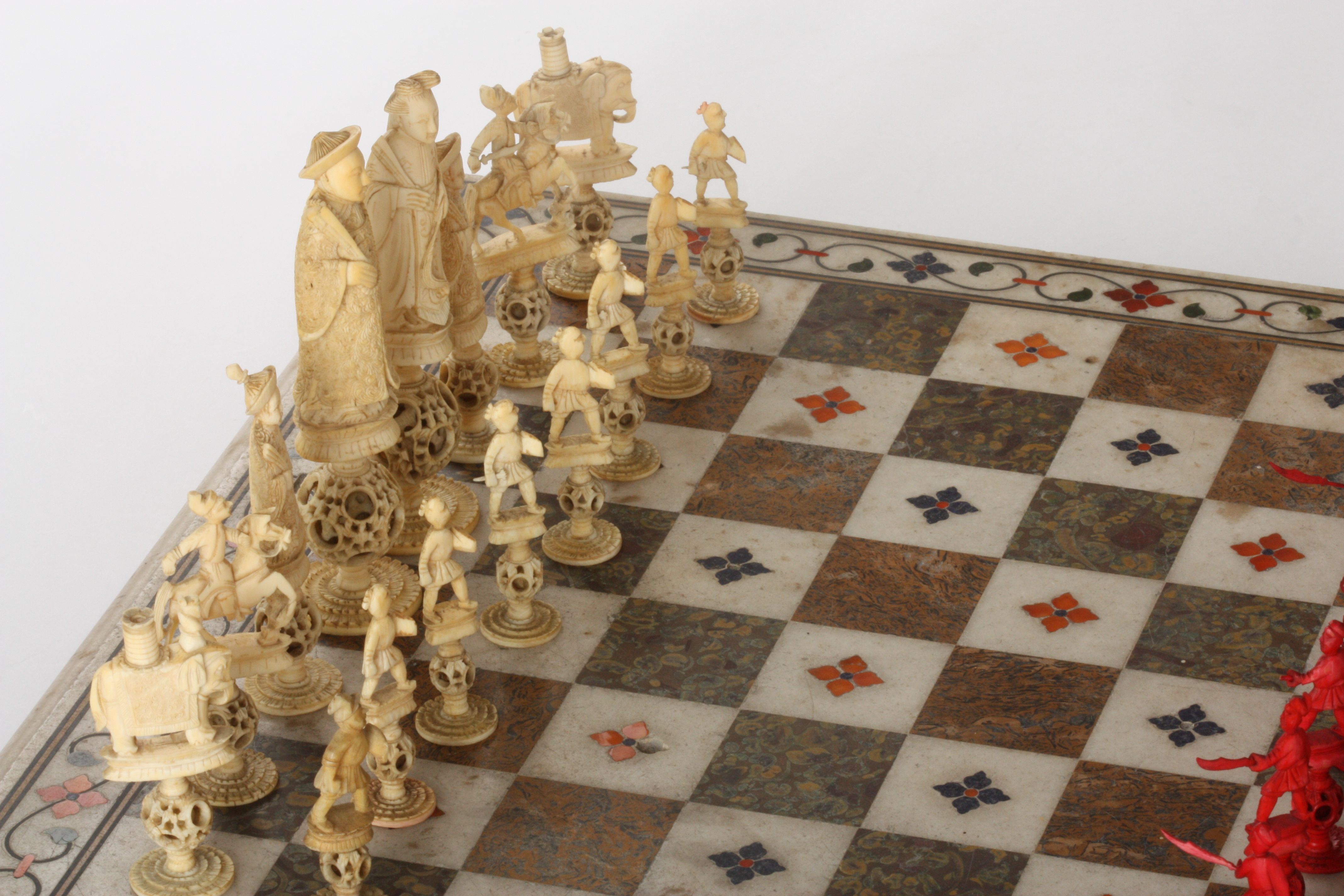 A Chinese carved ivory 'puzzle ball' figural chess set
Canton, early 19th century
one side of the - Image 3 of 6