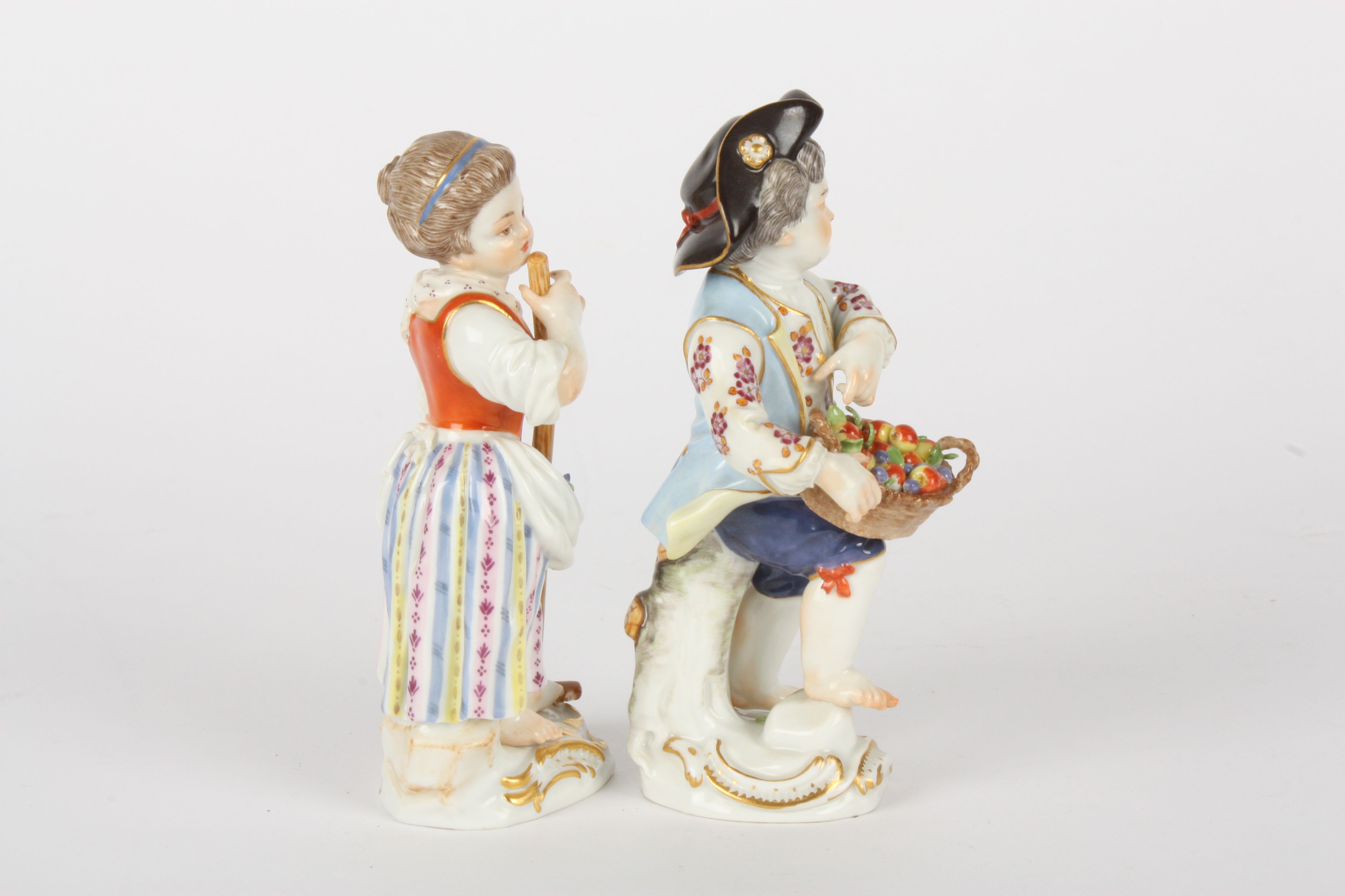 Pair of late 20th century Meissen gardener boy and girl figures, each modelled standing, the girl - Image 4 of 5