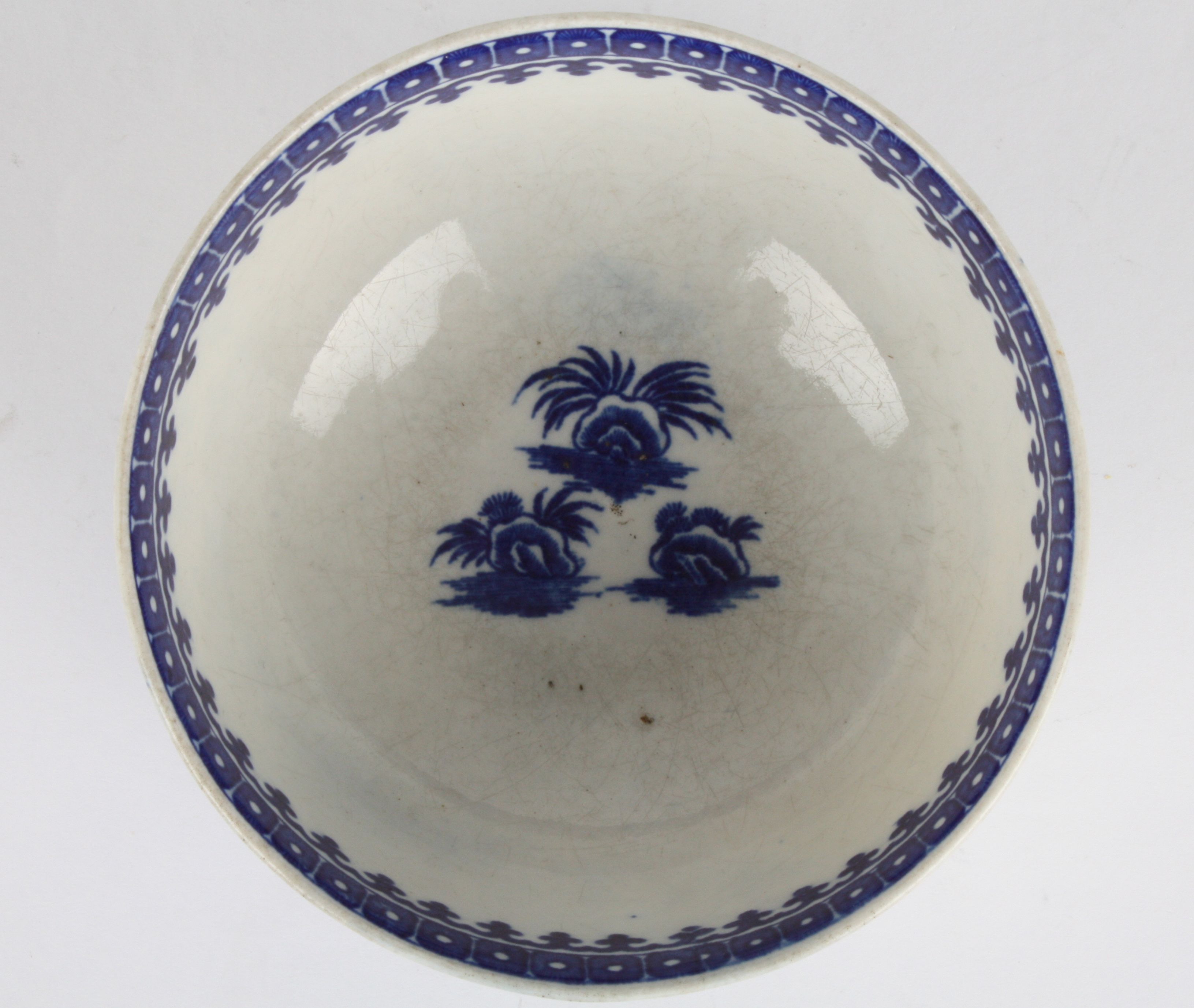 A late 18th century Worcester transfer printed blue and white bowl
decorated in the Fisherman and - Image 4 of 4