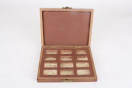 A set of Sterling silver ingots 'Royal Palaces'hallmarked Birmingham 1976, embossed with profiles