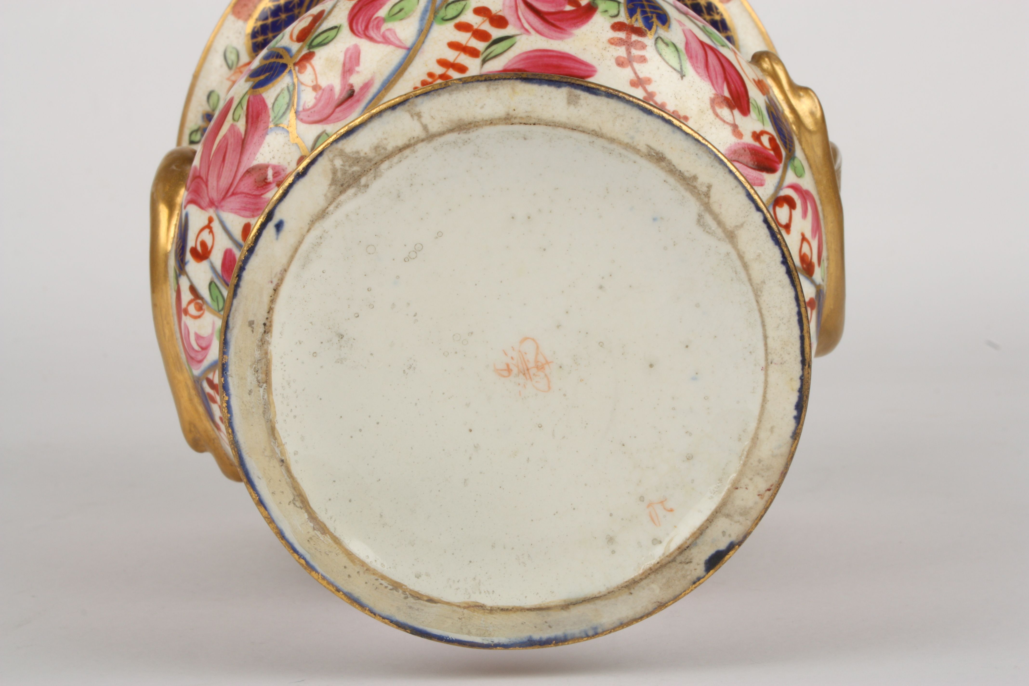 An early 19th century Derby Imari campagna urn
decorated with pink flowers, leaves and scrolls on - Image 3 of 3