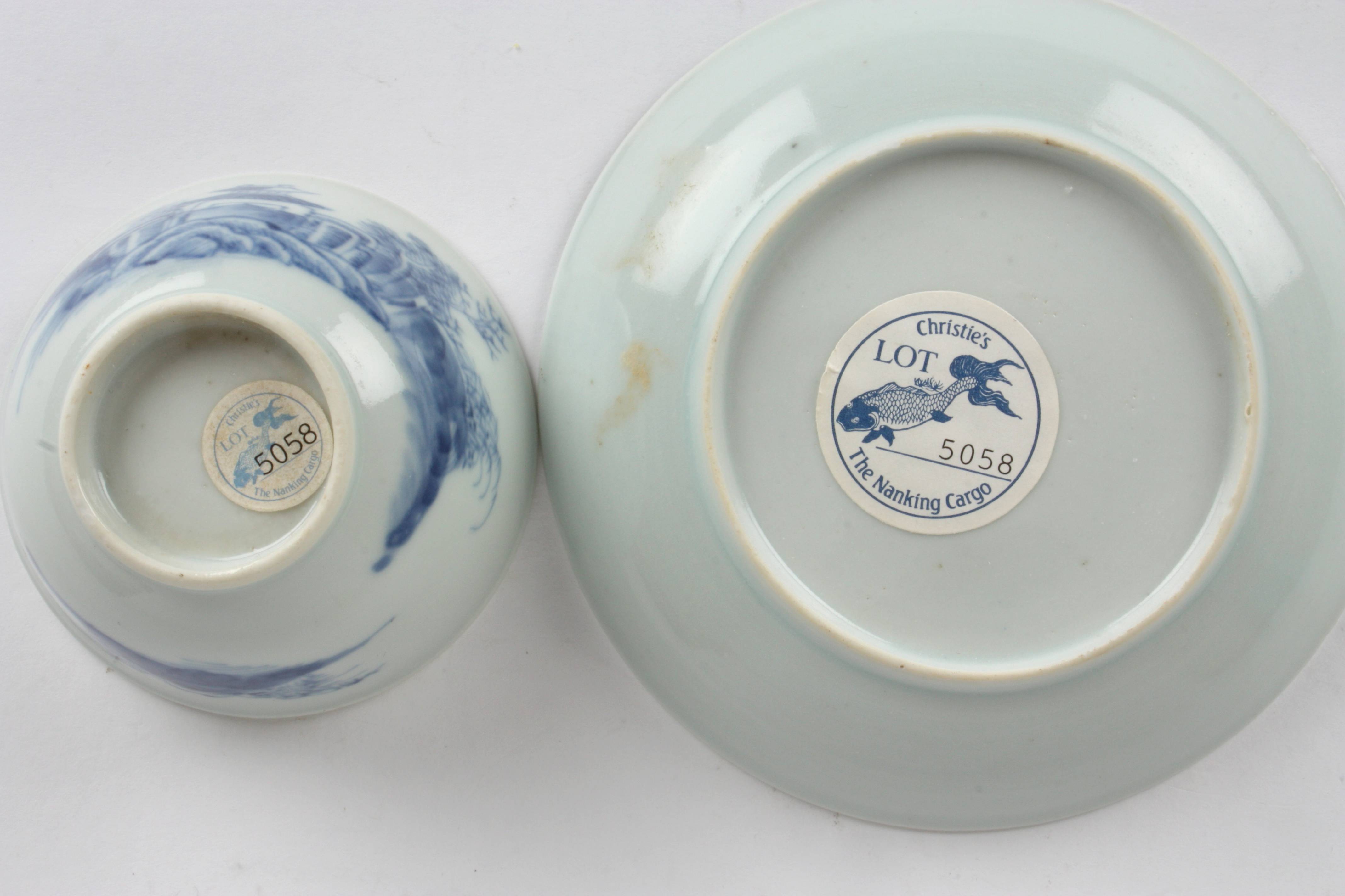 A Nanking Cargo blue and white porcelain tea bowl and saucer
painted with a landscape scene with - Image 2 of 2