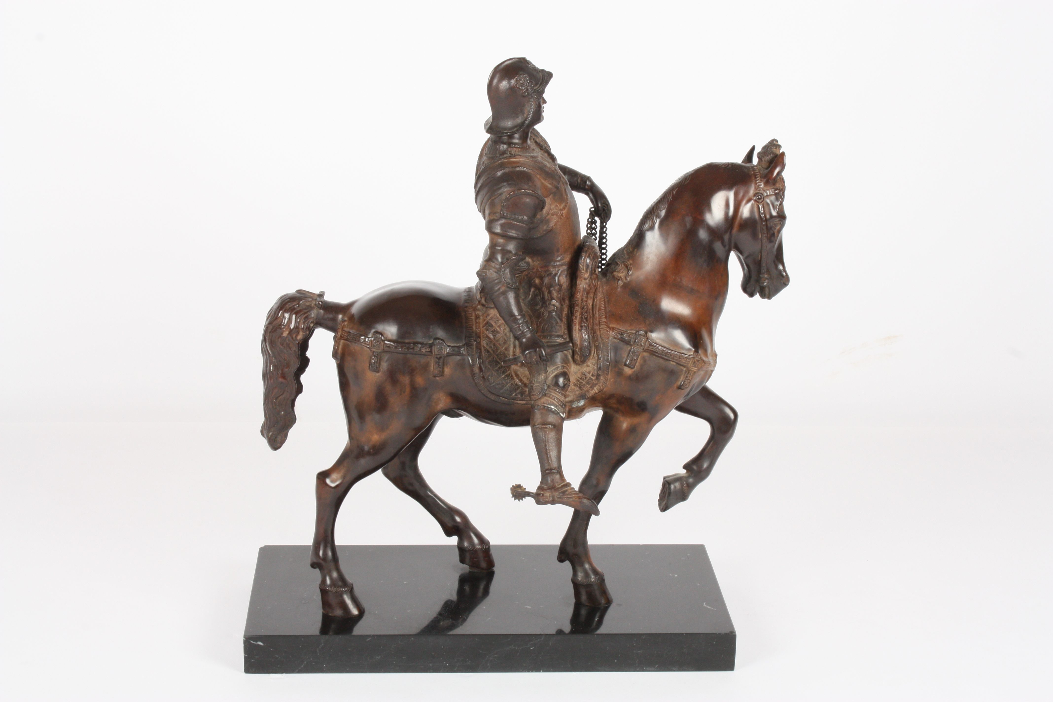 A 20th century bronze horse
the heavily cast sculpture depicting a warrior on a horse wearing - Image 3 of 5