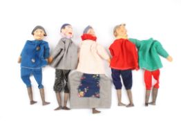 A set of four early 20th century hand puppetswith painted wooden heads and fabric bodies,