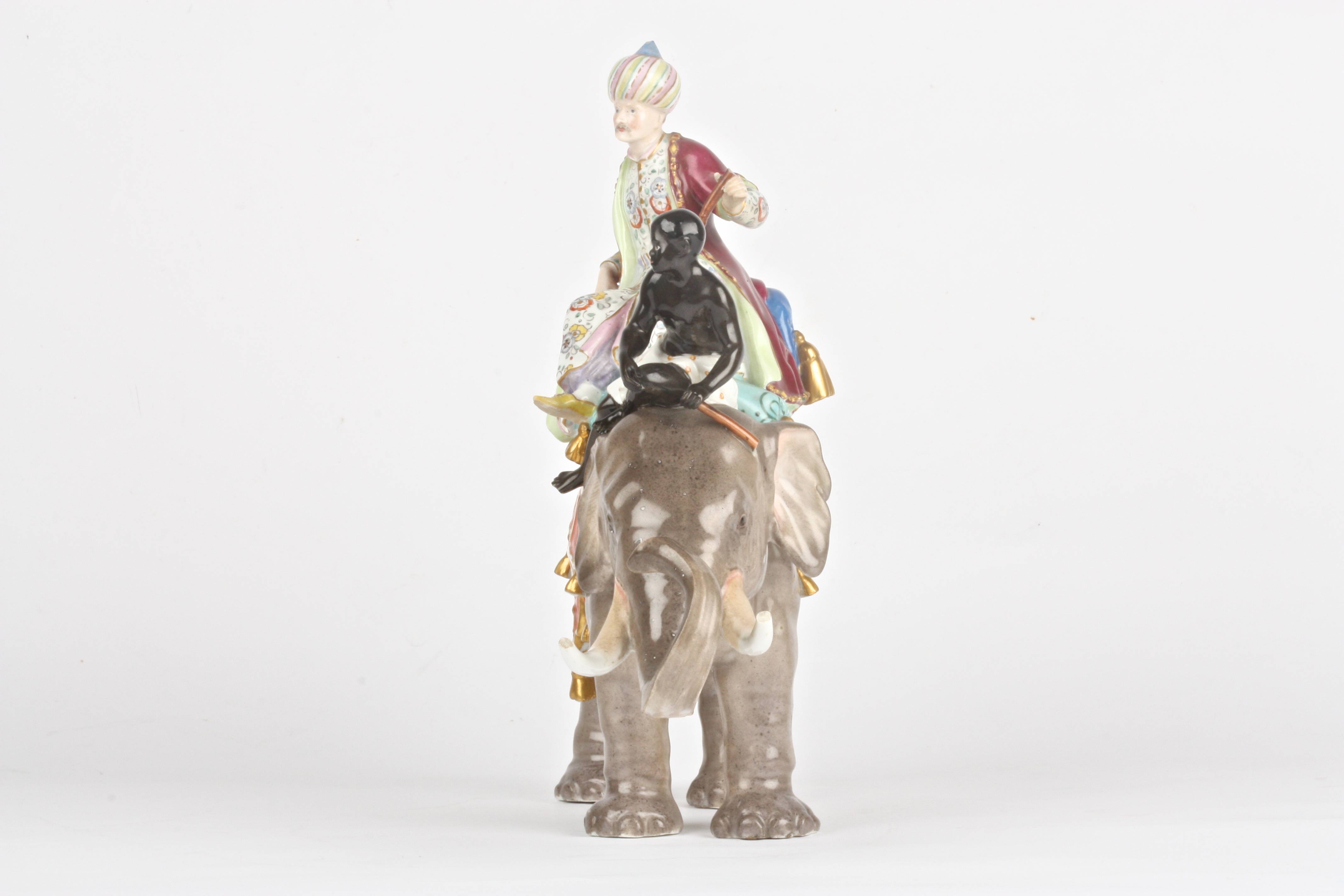 A late 19th century Meissen group of a sultan and black boy riding an elephant after a model by J. - Image 4 of 8