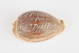 A cameo shelldated 1861with presentation inscription, length 7.8cmCondition: Good condition