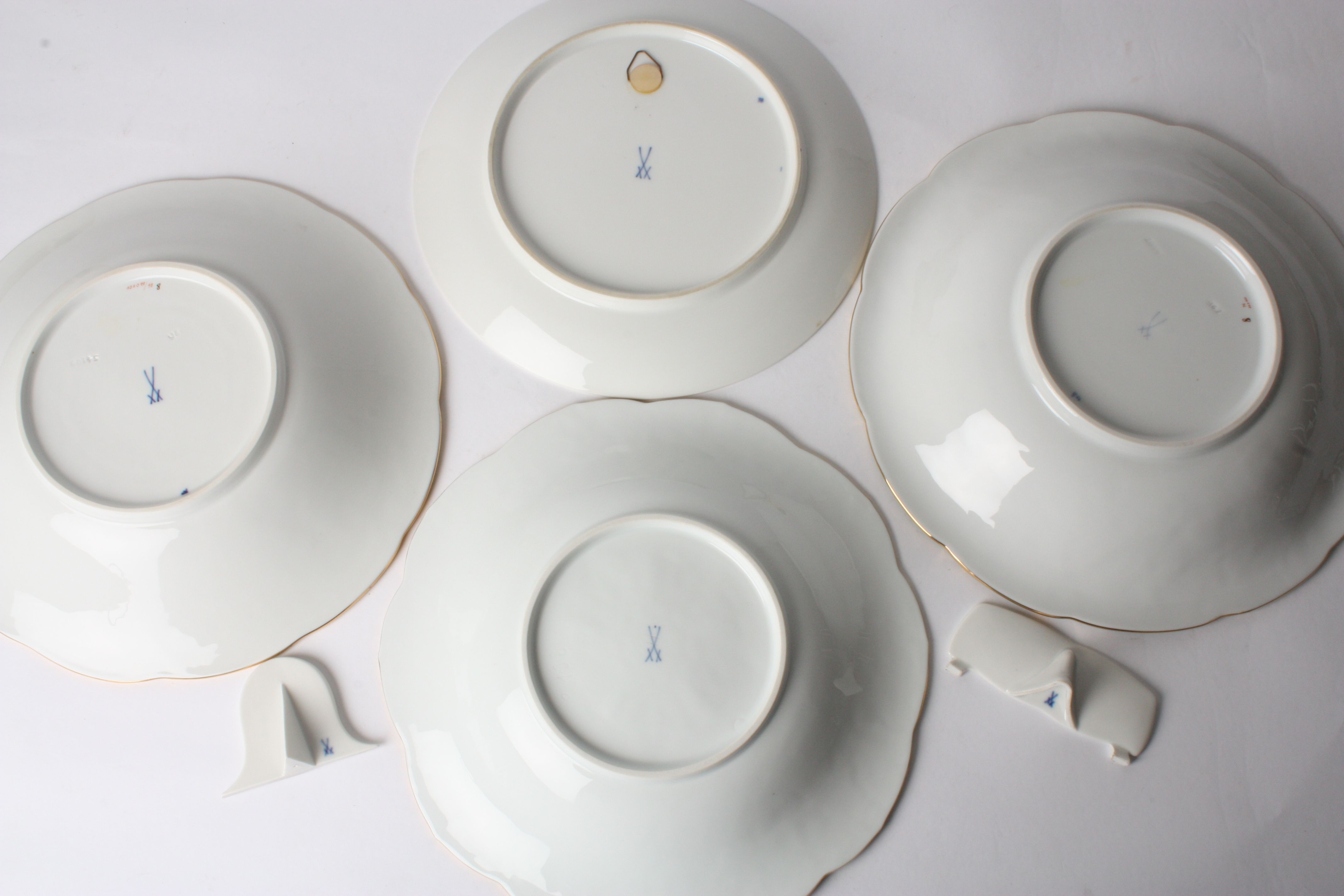 A collection of four late 20th century Meissen porcelain dishes all of different designs, painted - Image 2 of 2