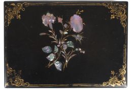 A Victorian black lacquer papier mache work boxthe top painted with flowers and inlaid with