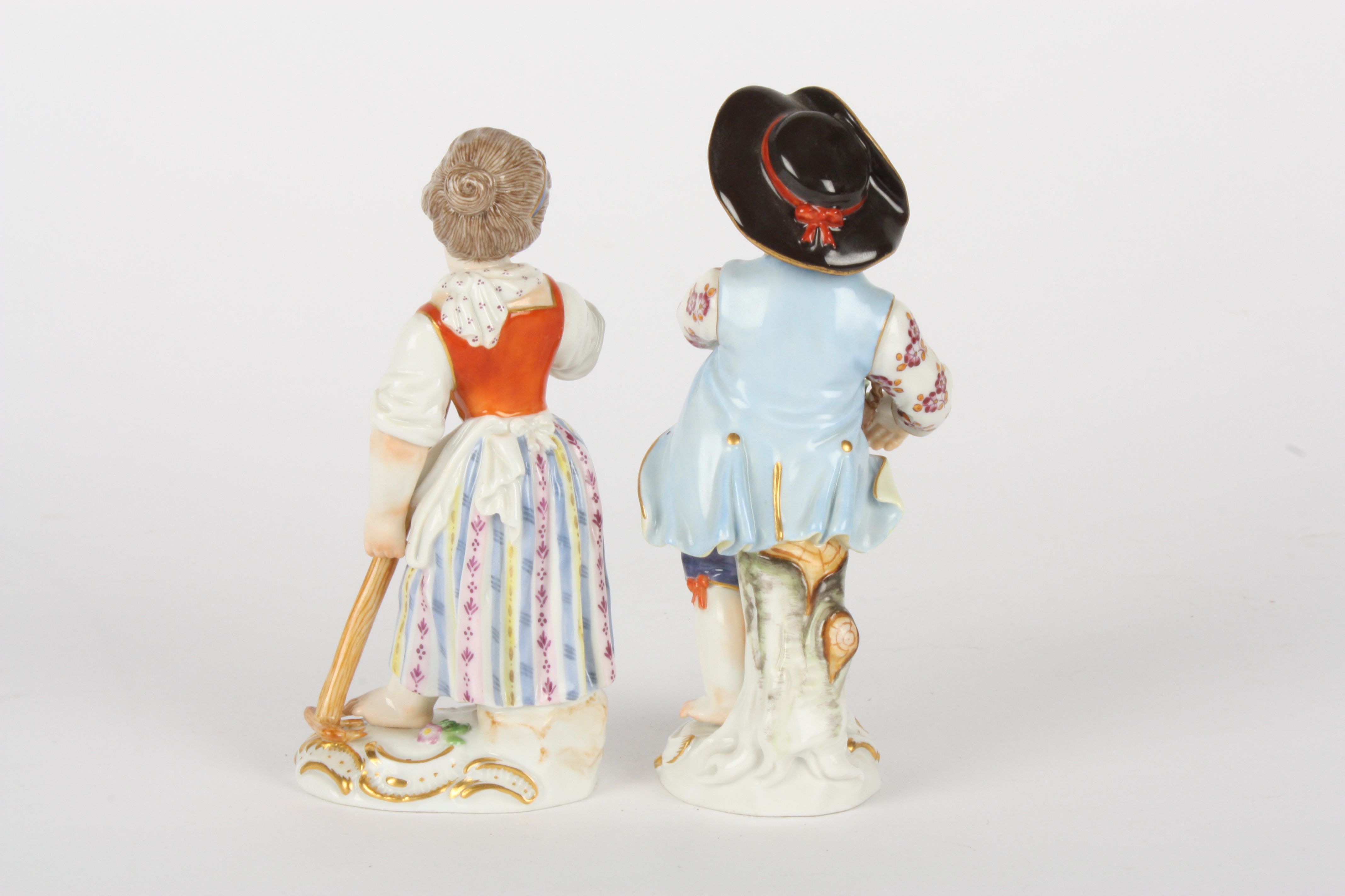 Pair of late 20th century Meissen gardener boy and girl figures, each modelled standing, the girl - Image 2 of 5