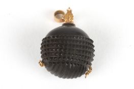 A Georgian carved nut scent bottlepossibly coquilla nut, carved with hobnail decoration, with