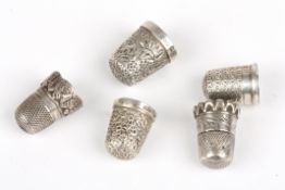 A group of five Victorian silver thimblesincluding one by Charles Horner, Condition: Some wear