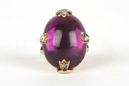 A large Victorian cabochon amethyst and diamond ringset with a large oval cabochon amethyst