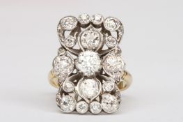 A large gold and old cut diamond cluster rectangular dress ringset with central stone weighing