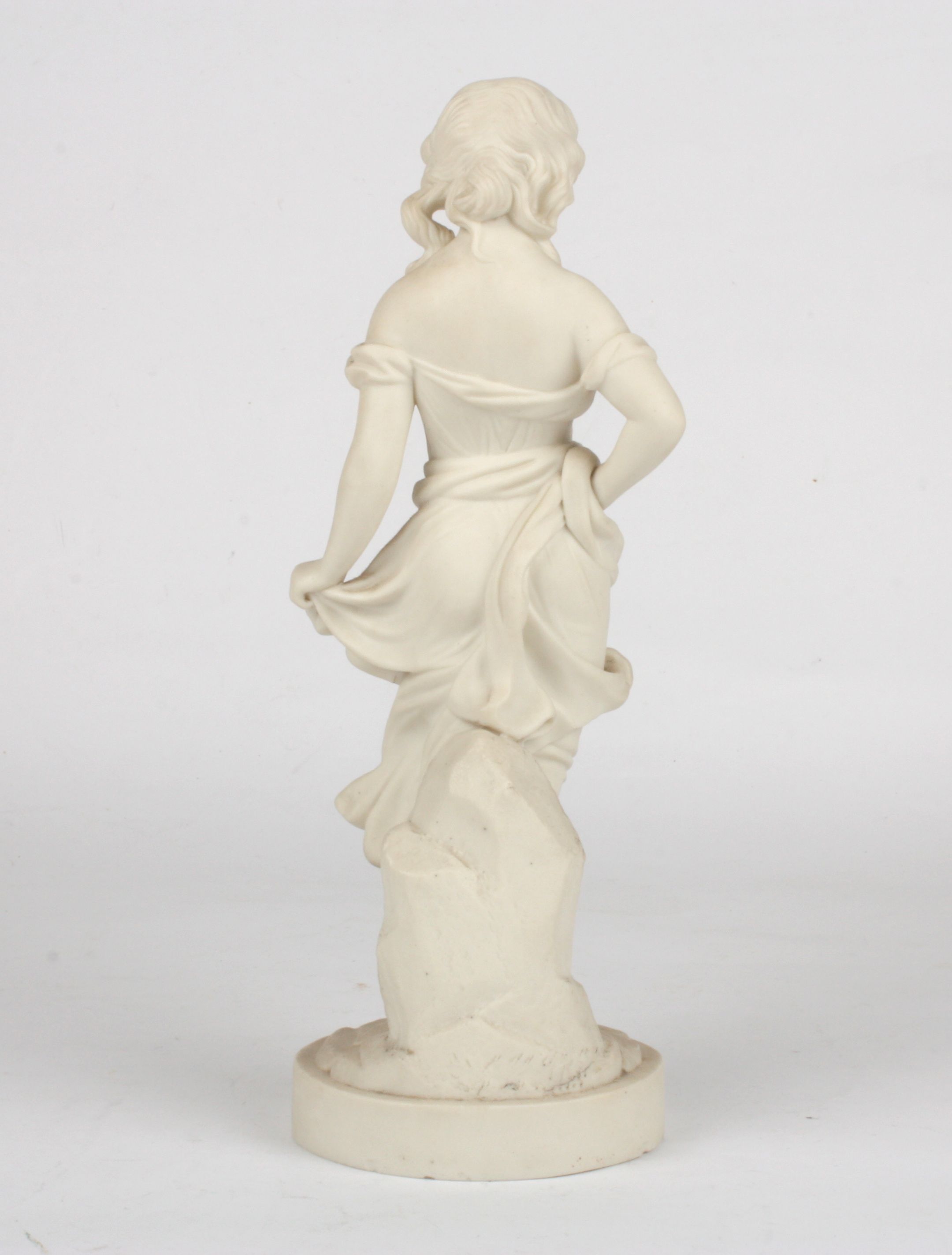 A Victorian style Parian figure of a young girl
stood wearing a flowing robe and supported on a - Image 2 of 2