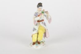 Late 20th century Meissen figure, after Elias Meyer, modelled as a seated Japanese lady feeding an