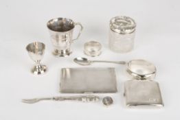 A collection of assorted silver itemsincluding two engine turned cigarette cases, a christening