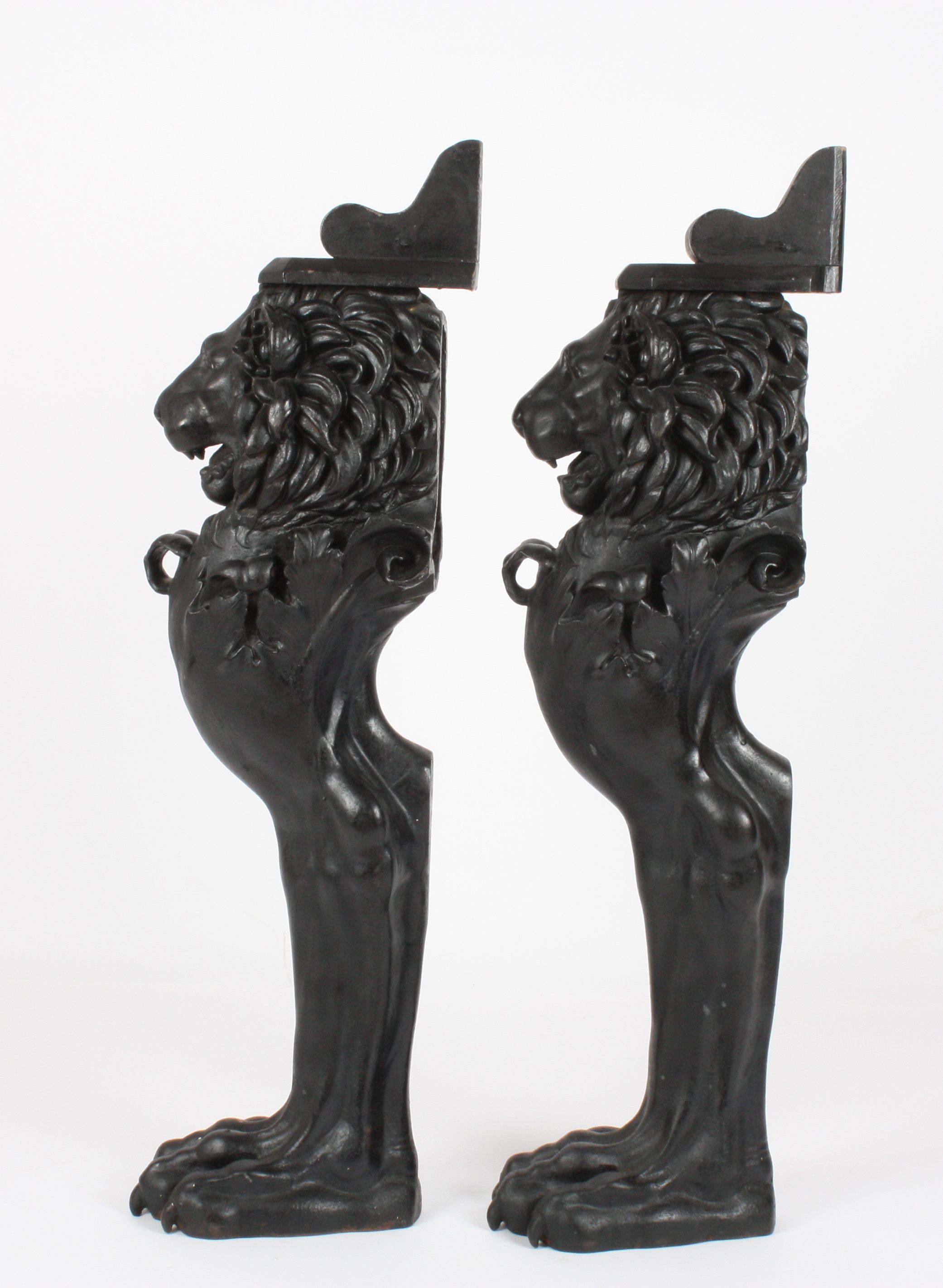 A pair of Victorian design heavy cast iron lion caryatid console supports
the lions in black painted - Image 2 of 2