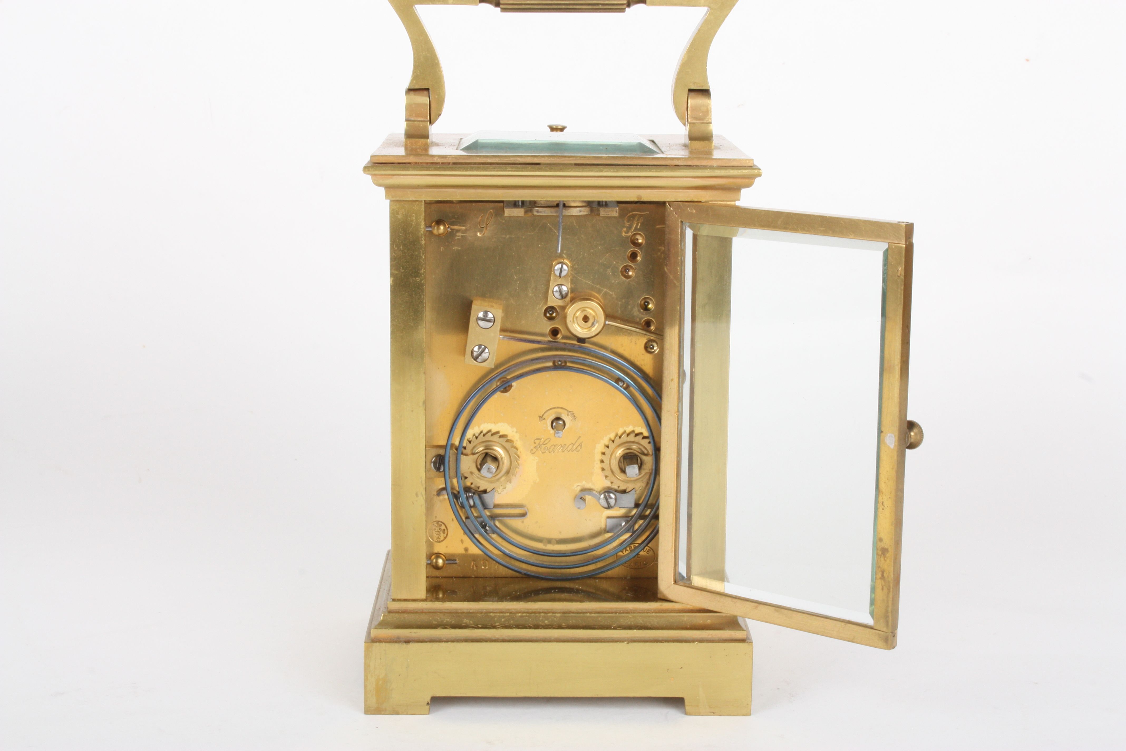 An Edwardian brass repeating carriage clock
with white enamel dial and black Roman numerals, plain - Image 4 of 4