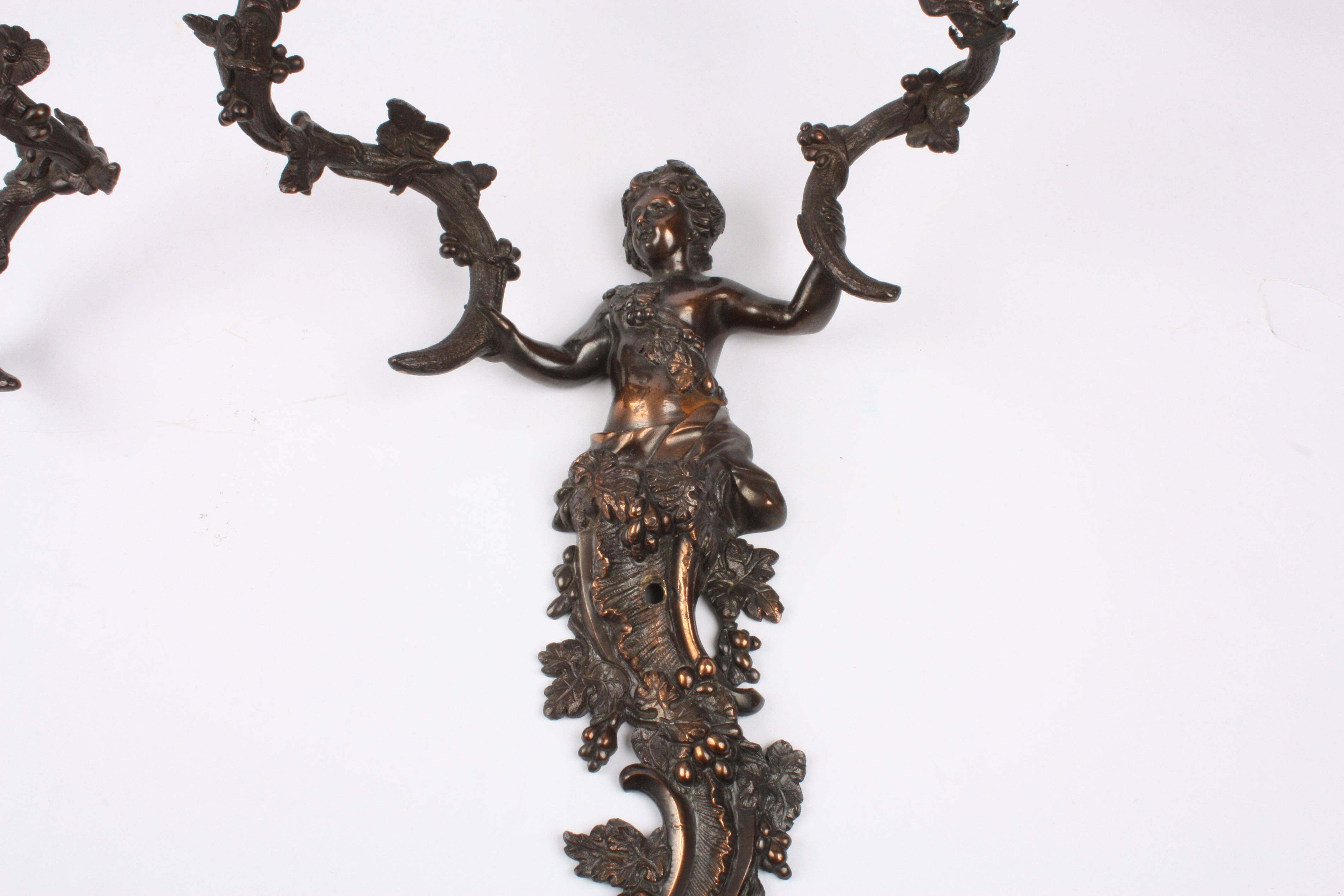 A large pair of early 20th century French brass two branch wall sconces
formed as cherubs holding - Image 2 of 3