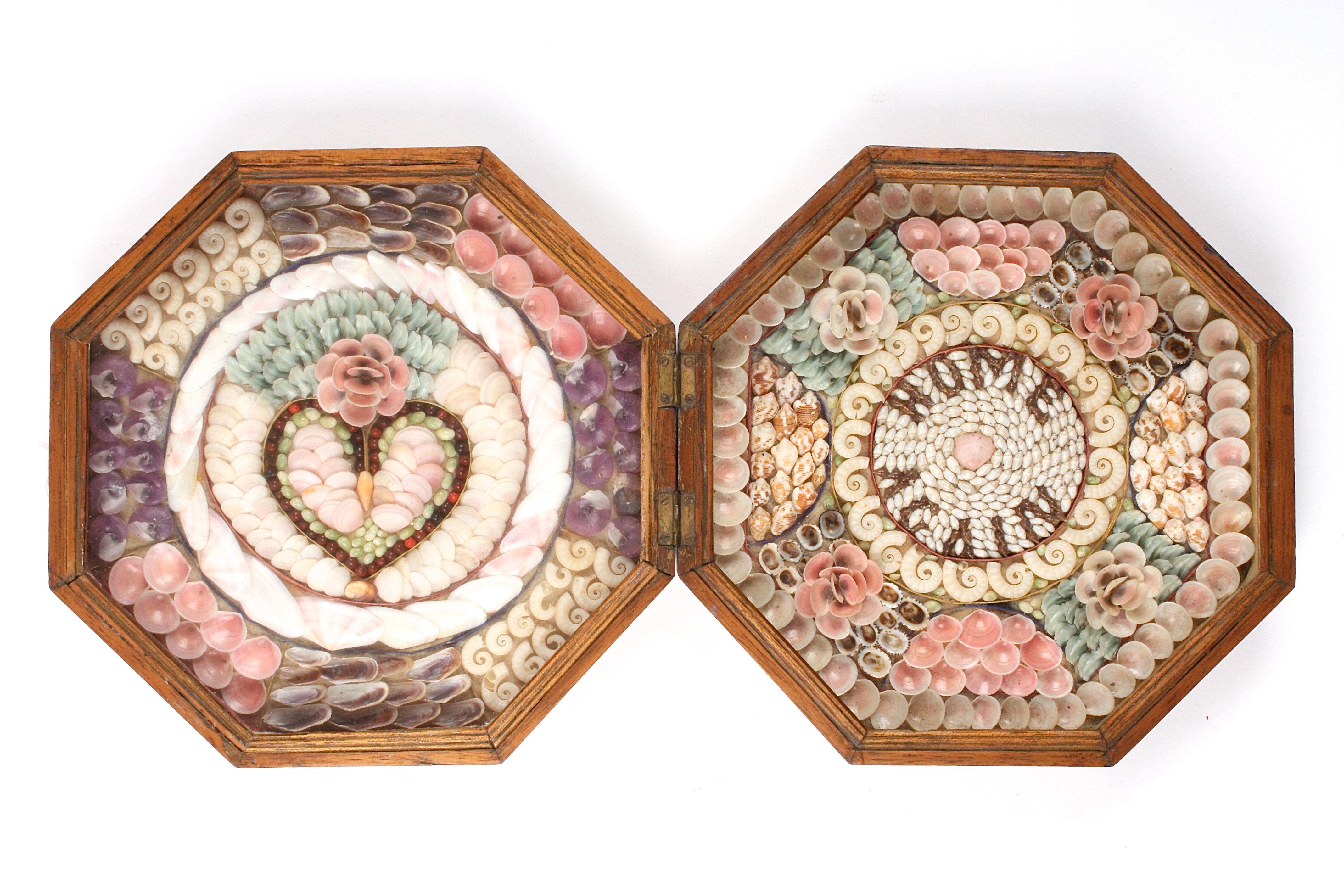 A sailor's shell valentine
West Indies, late 19th century
the octagonal wooden frame opening up to