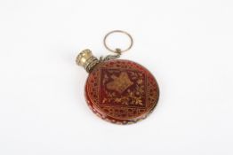 A small Victorian red glass scent bottlewith gilt metal lid, the body with gilt decoration and VR