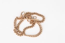 A 9ct gold curb link Albert chain with cross barwith two clasps, 42.8 grams.Condition: Good