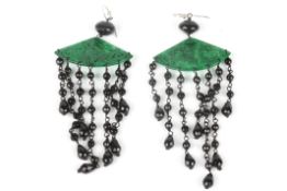 A pair of 1920s design French jet and jade earringsformed as pierced and carved green jade fan
