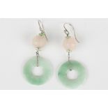 A pair of Chinese carved jade and rose quartz earrings
the pierced jade rings suspended from