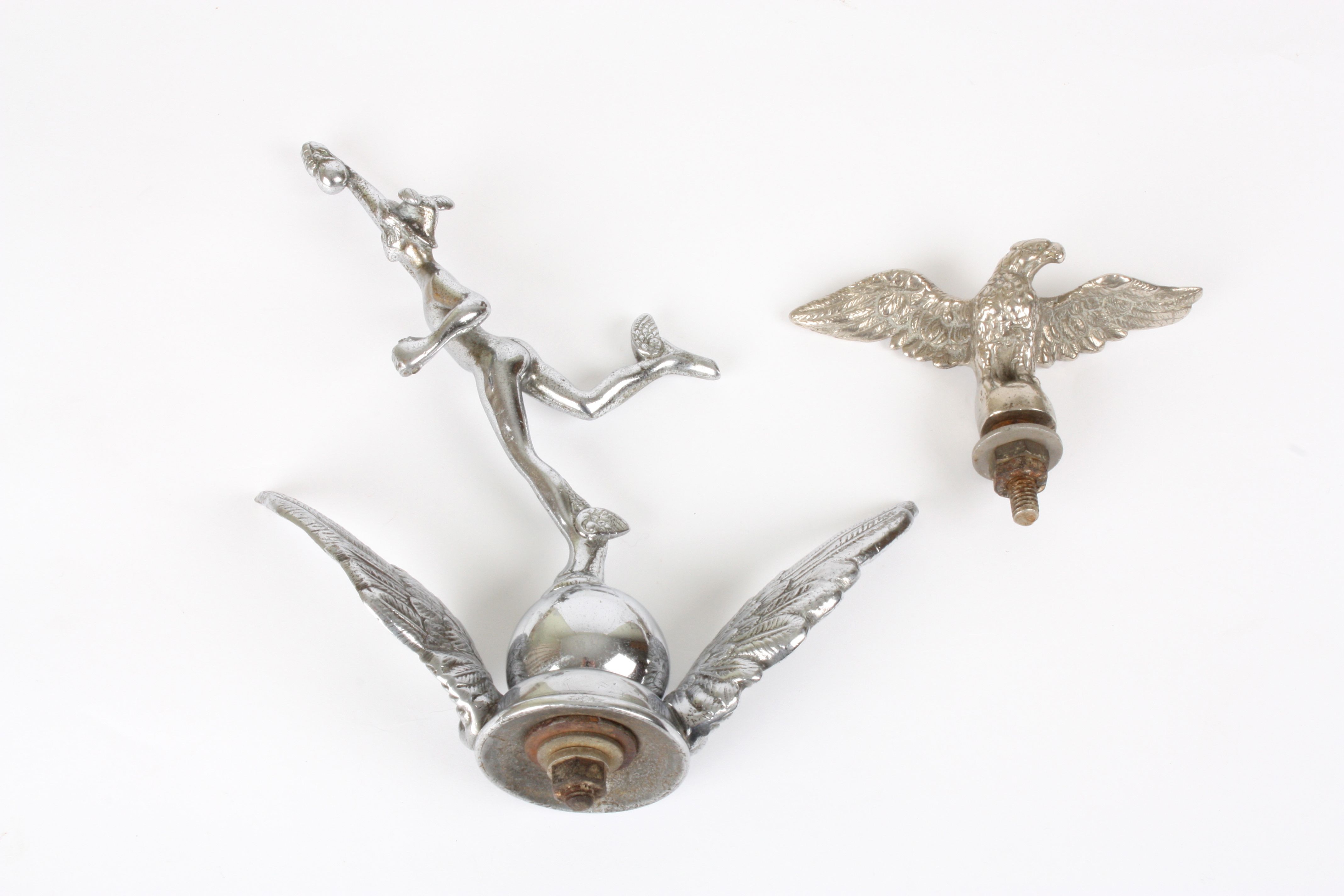 A 1930s chrome car mascot of Mercury, 
supported on a winged orb, together with a smaller chrome