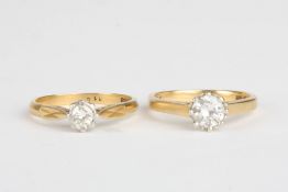 Two diamond and gold solitaire ringsboth set in 18ct yellow gold, set with stones weighing