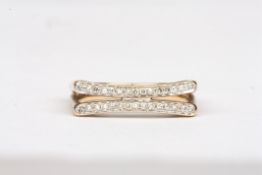 A 9ct gold and diamond split shank ringof squared form set with two rows of small diamonds,