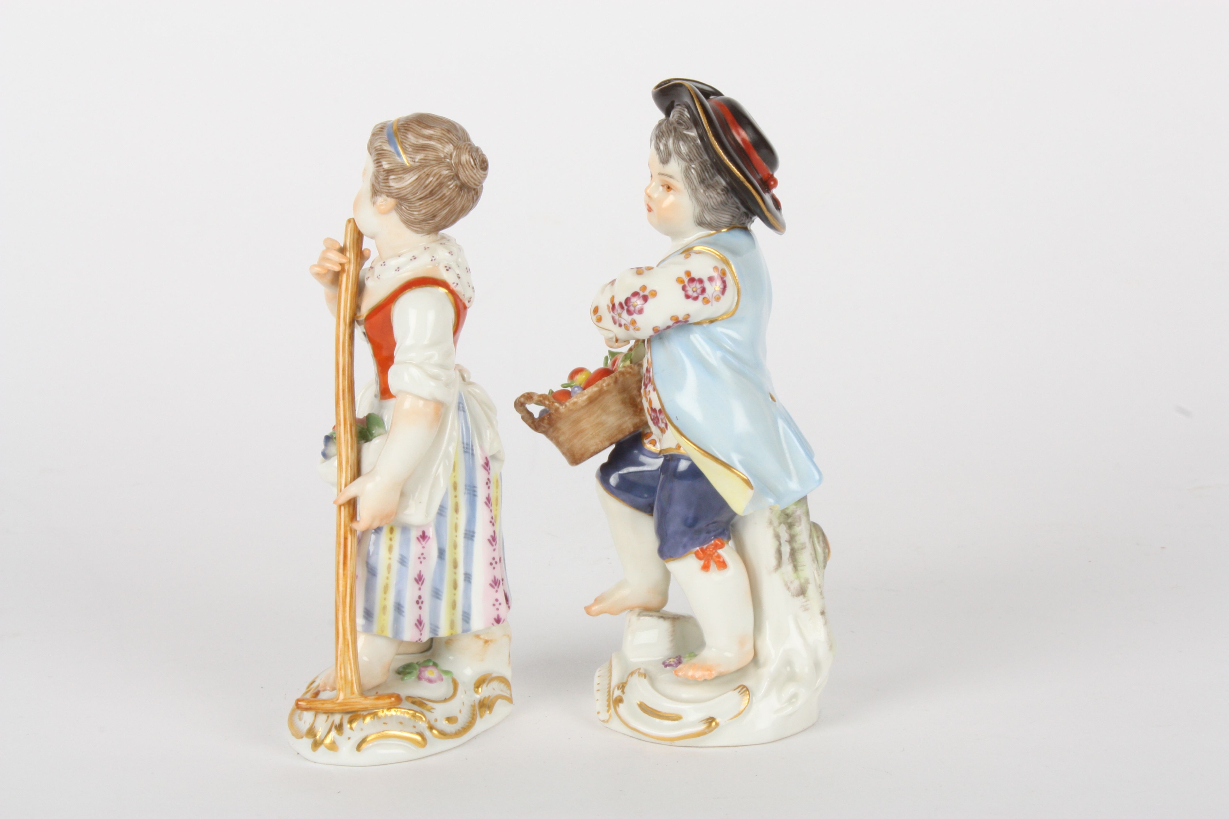Pair of late 20th century Meissen gardener boy and girl figures, each modelled standing, the girl - Image 3 of 5