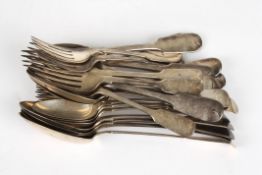 A collection of Georgian, Victorian and later silver cutlerycomprising spoons and forms in fiddle