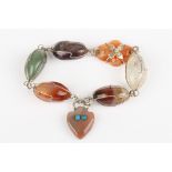 An early 20th century Scottish specimen agate and semiprecious stone bracelet
of wire-wrapped