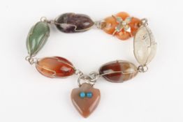 An early 20th century Scottish specimen agate and semiprecious stone braceletof wire-wrapped