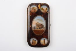 A faux tortoiseshell grand souvenir of Paris cigar casewith inset roundels to the front depicting