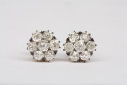 A pair of antique old cut diamond cluster earringseach set with a central stone measuring approx