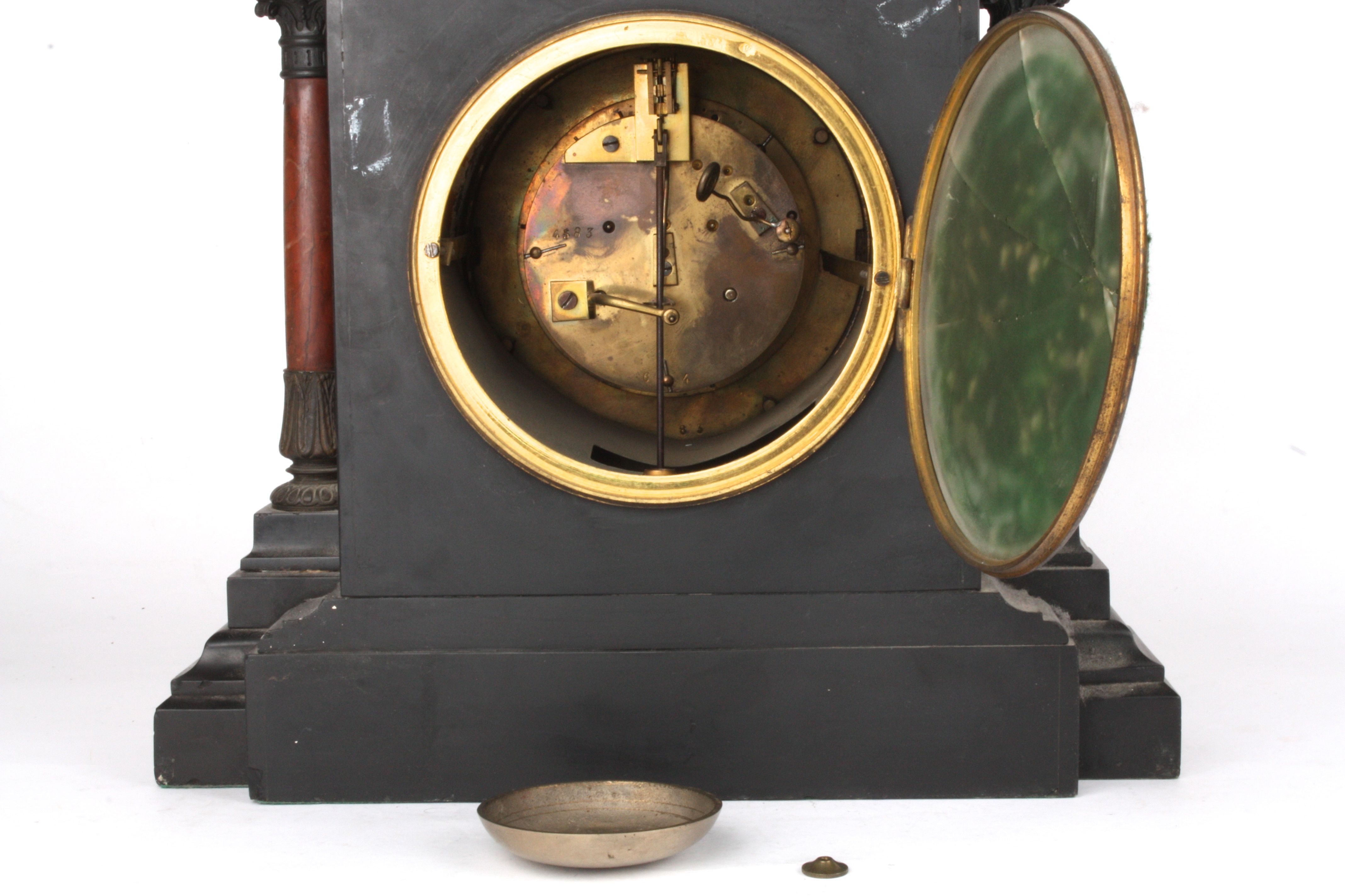 A French late 19th century red and black marble mantle clock
retailed by Howell & Jones
the 5 1/4 - Image 4 of 4