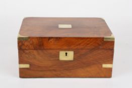 A mahogany writing slopewith brass bound edges and blank cartouche to the lid and escutcheon,