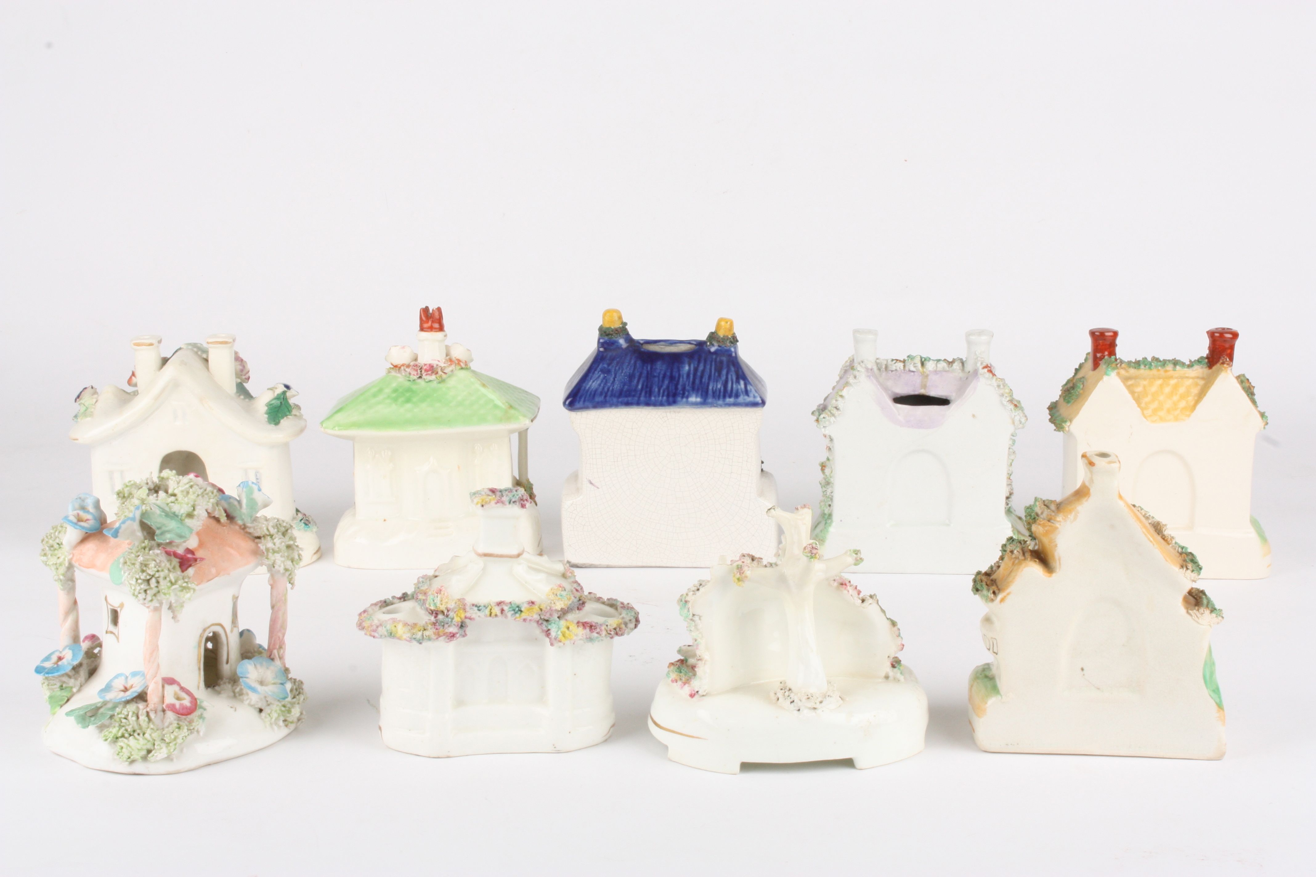 A collection of eight Victorian Staffordshire pottery pastille burner cottages
all with encrusted - Image 2 of 2