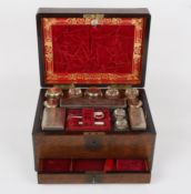 A late 19th century dressing table boxthe mahogany case with lid lifting up to reveal red velvet