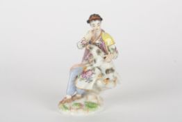 Late 20th century Meissen figure after Elias Meyer, modelled lady seated holding a lamb, painted