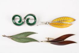 A group of four Norwegian silver and enamel broochestwo by N.M. Thune, one by Ivory Holth the