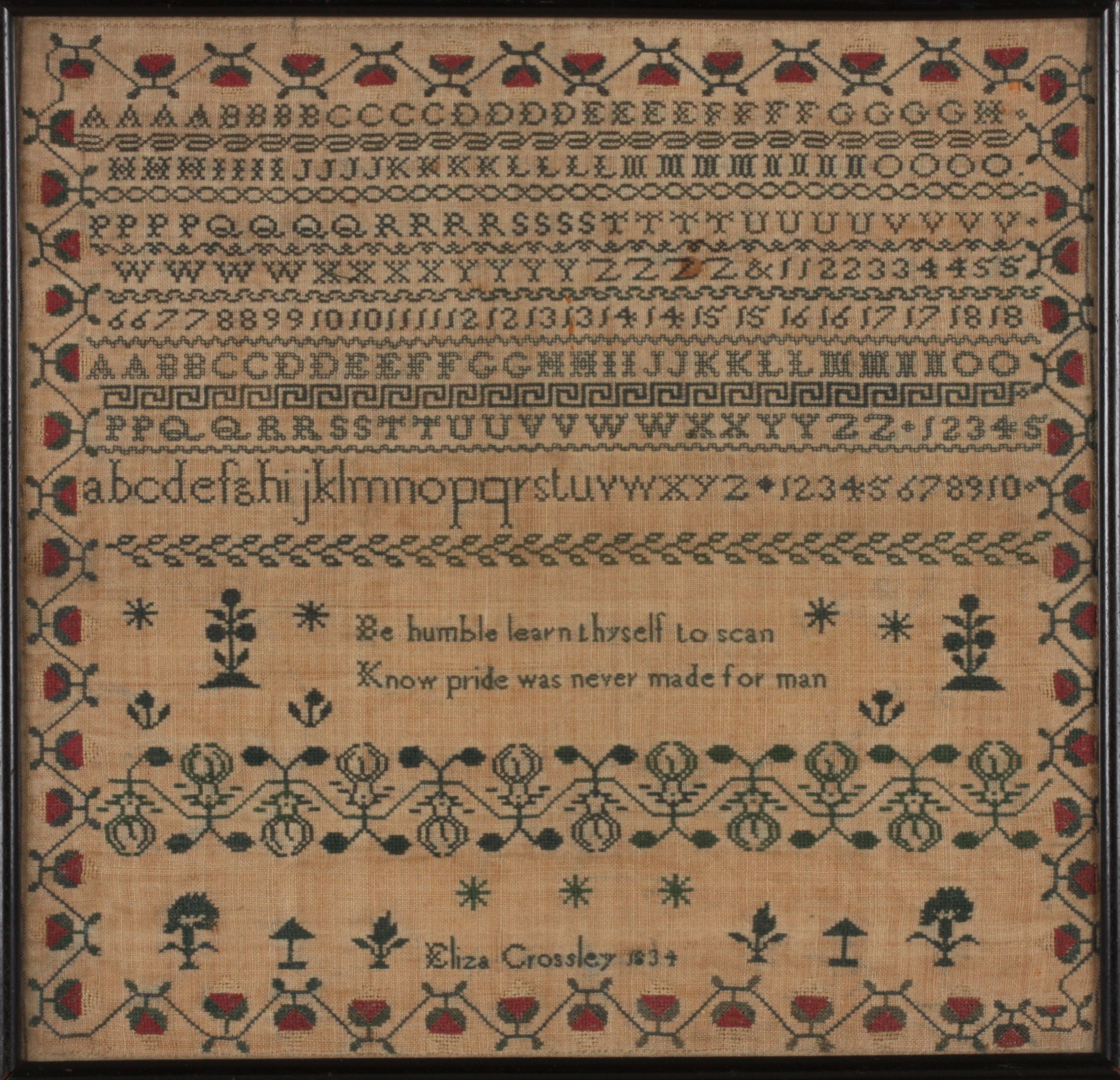 A William IV sampler
embroidered in green and red coloured thread by Eliza Crossley dated 1834,