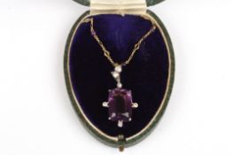 An early 20th century amethyst, diamond and gold necklacewith large rectangular amethyst surrounded