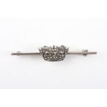 An early 20th century silver and marcasite bar brooch
formed as a crown on a plain bar, 3.7 grams.